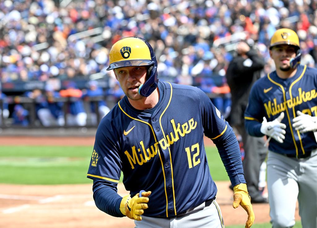 Milwaukee Brewers Rhys Hoskins after he scores on his two-run home run during the third inning against the New York Mets.