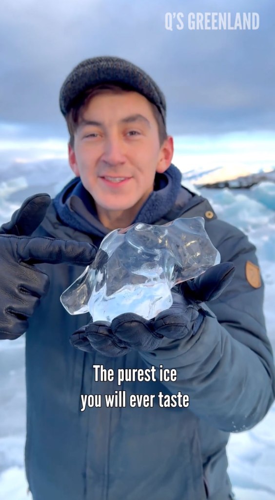 Malik Rasmussen poses with piece of ice 