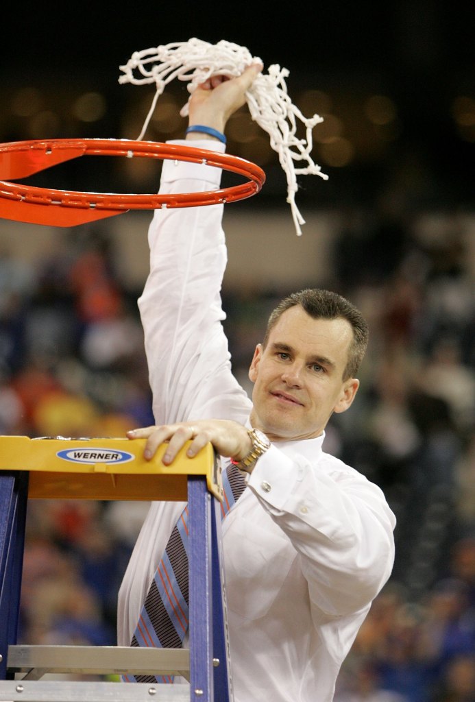 Head coach Billy Donovan of the Florida Gators celebrates by cutting down the net after defeating the UCLA Bruins 73-57 during the National Championship game of the NCAA Men's Final Four on April 3, 2006 at the RCA Dome in Indianapolis, Indiana.