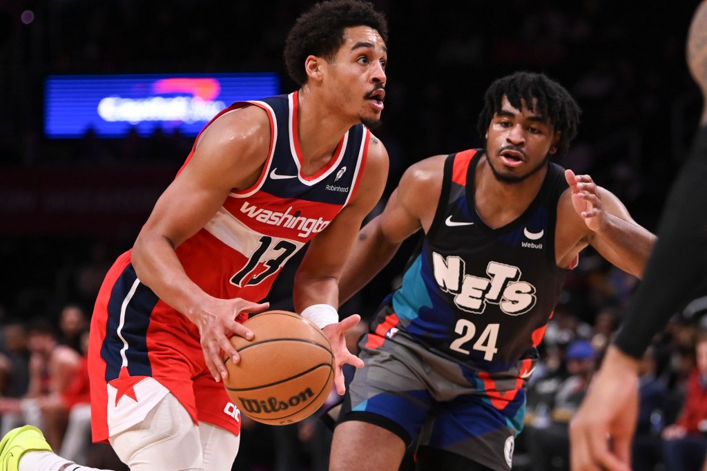 Washington Wizards guard Jordan Poole (13) makes a move to the basket during the second  half on Brooklyn Nets guard Cam Thomas (24) at Capital One Arena.