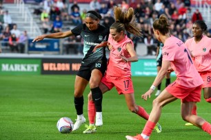 NJ/NY Gotham FC midfielder Yazmeen Ryan (18) controls the ball as North Carolina Courage midfielder Dani Weatherholt (17) defends at WakeMed Soccer Park. 