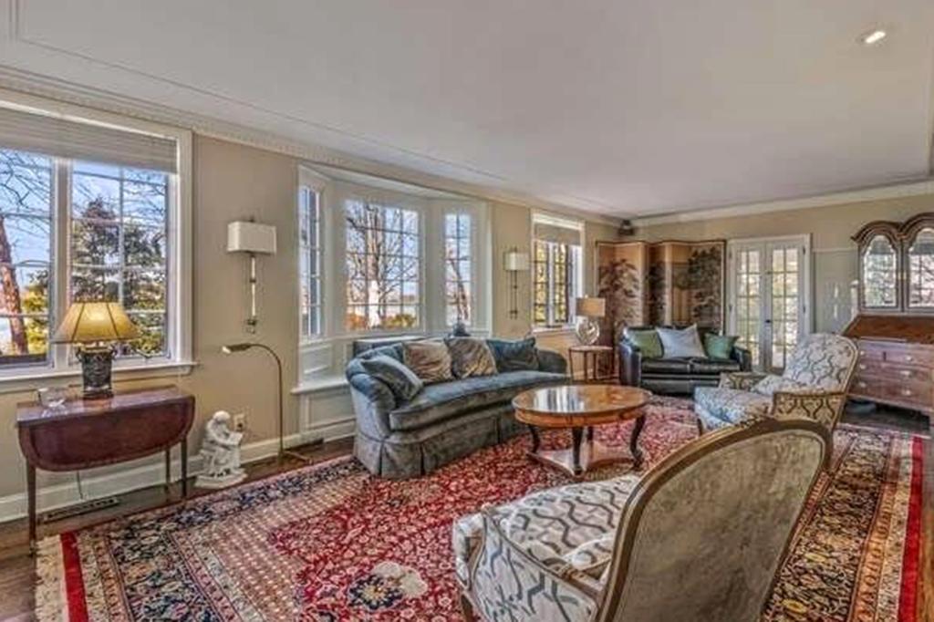 The formal living room with wall to wall windows.