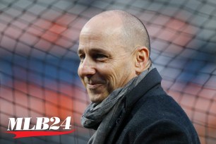 New York Yankees General Manager Brian Cashman watches batting practice before Game 4 of baseball's American League Championship Series against the Houston Astros Thursday, Oct. 17, 2019, in New York.