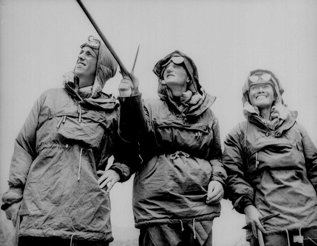 Edmund Hillary, left, Col. John Hunt, center and Sherpa Tenzing Norgay look towards Mount Everest in July 1953.