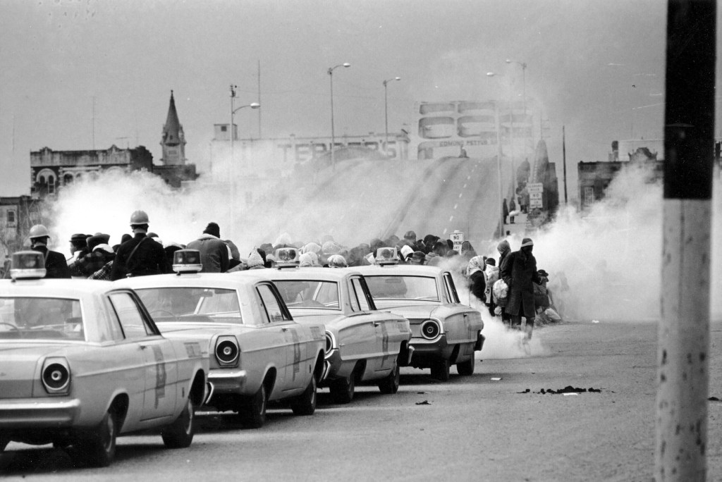 State troopers using tear gas on the marchers.