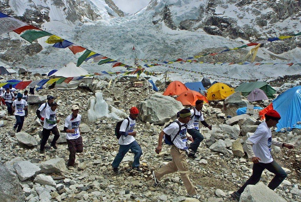 Participants run the Everest Marathon during a practice run at the Everest Base camp on May 17, 2003.