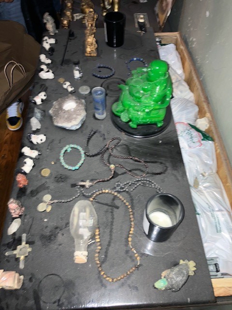 Items found among the drugs and money in an alleged drug den in the Bronx.