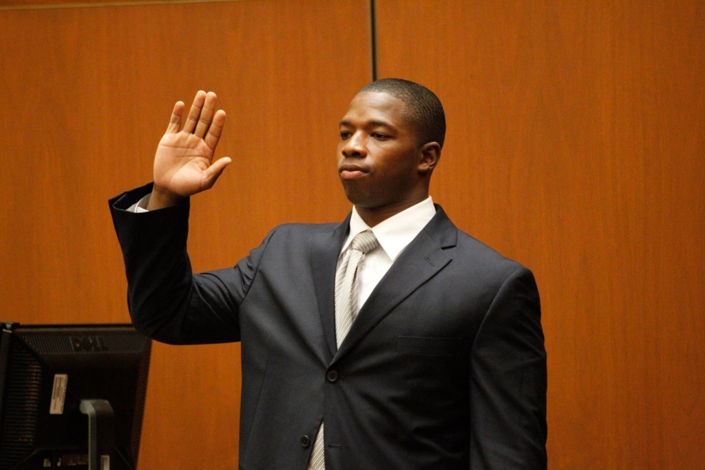 Faheem Muhammad shown being sworn in as a court witness.