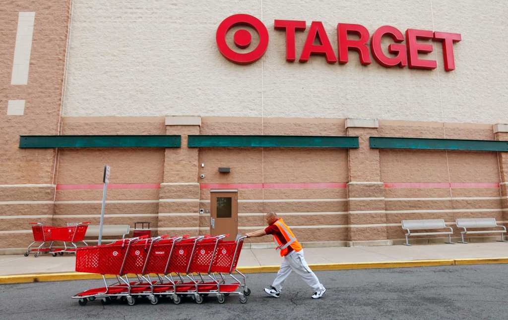 Target employee returning shopping carts to the store in Falls Church, Virginia on May 14, 2012