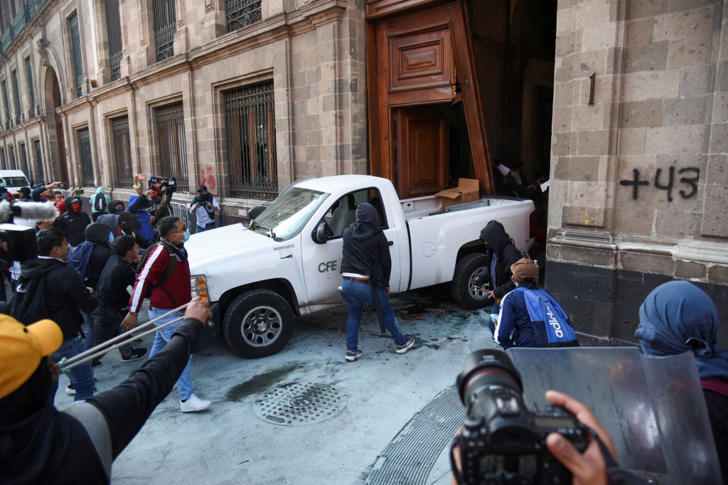 Protesters ram a truck through the doors of the National Palace in Mexico City, Mexico on March 6, 2024.