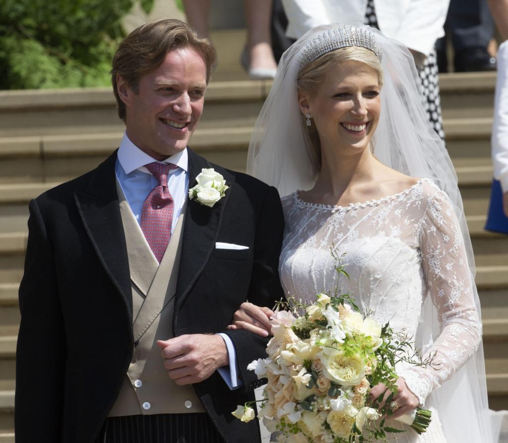 Lady Gabriella Windsor and Mr Thomas Kingston, pose together in front of a castle.