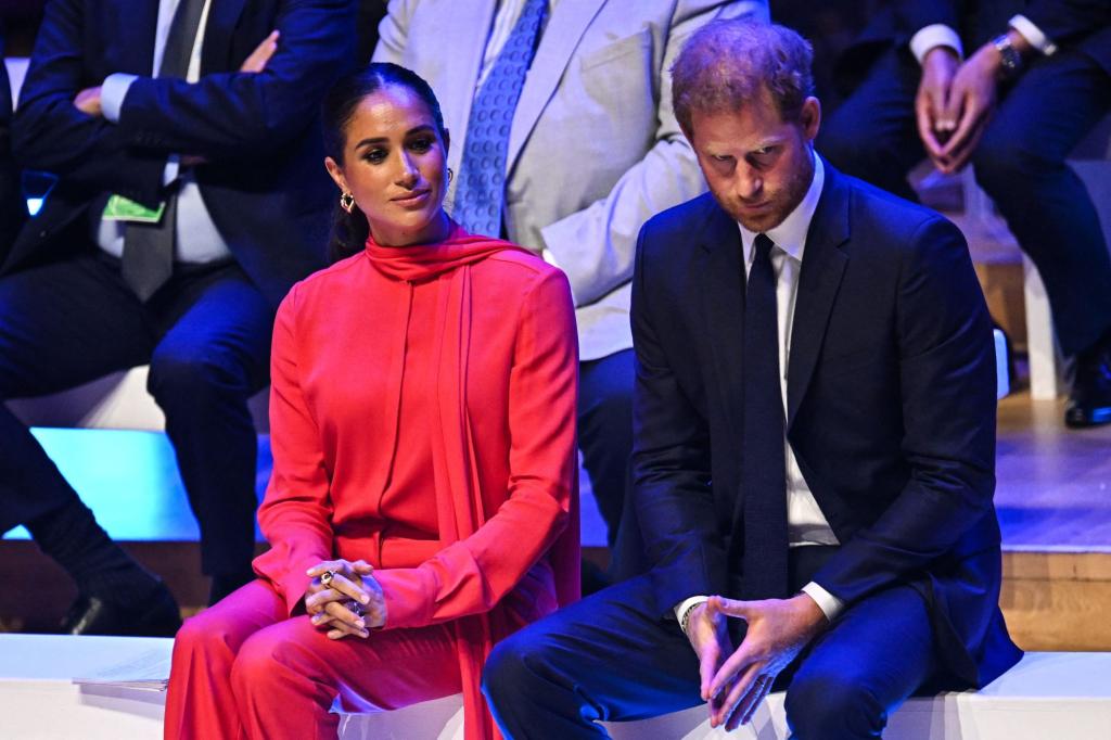 Prince Harry and Meghan, Duchess of Sussex, attending the One Young World Summit in Bridgewater Hall, Manchester in 2022
