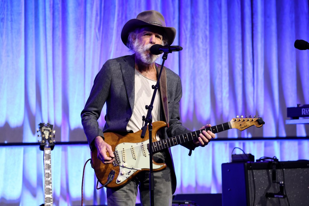 Bob Weir on guitar and singing.