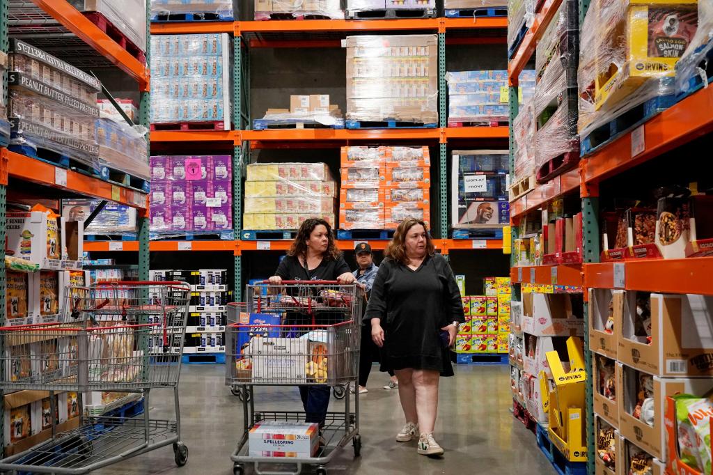 Customers selecting goods in a supermarket in Foster City, California, USA on February 28, 2024.