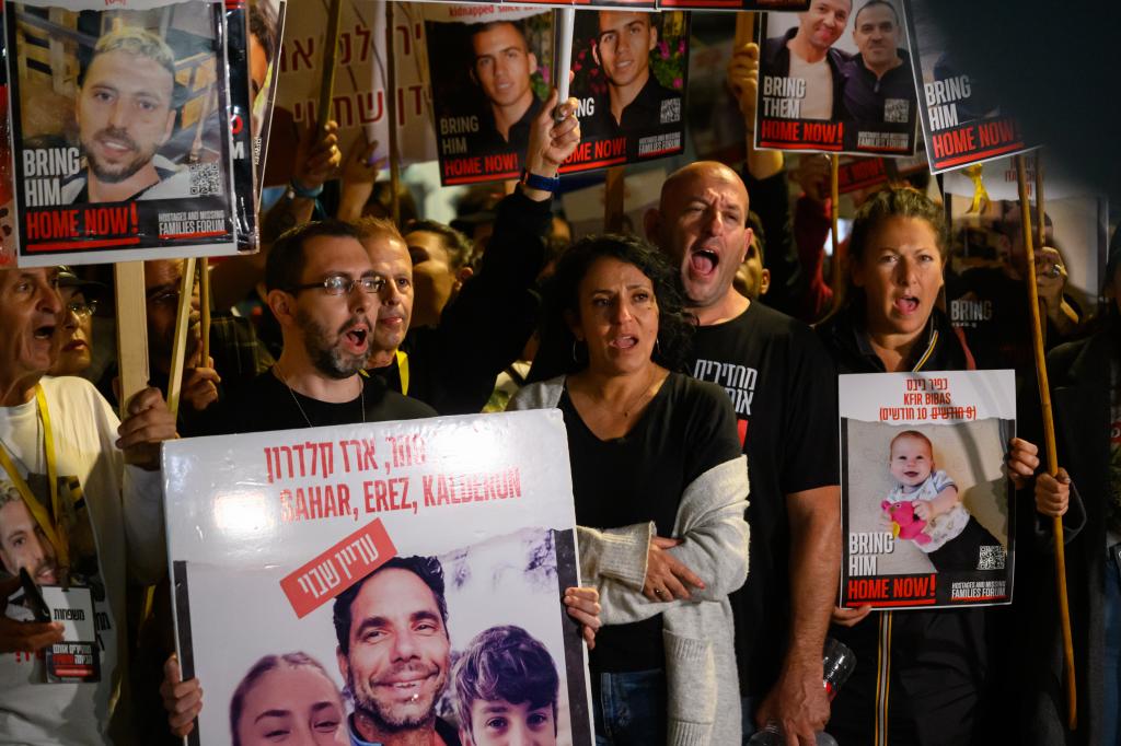 The families of hostages demonstrate outside the IDF headquarters