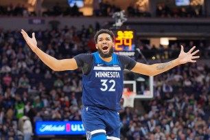 Timberwolves center Karl-Anthony Towns (32) complains about a call against the Portland Trail Blazers in the third quarter at Target Center. 
