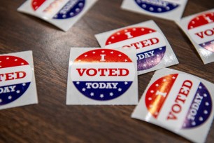 I voted stickers" on a table at Gloucester High School during Super Tuesday presidential primary, on March 5, 2024.