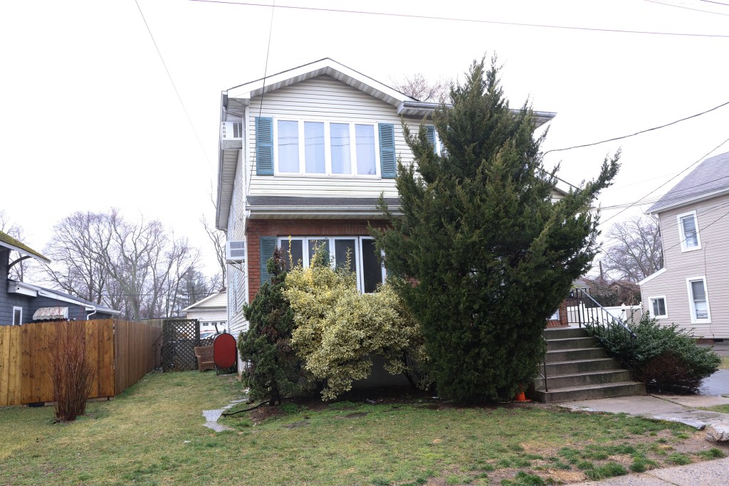 The house at 25 Railroad Ave Amityville, NY where reports of the Suffolk County Police raided the house earlier today they believe the person is involved in the body parts found in a Babylon park 