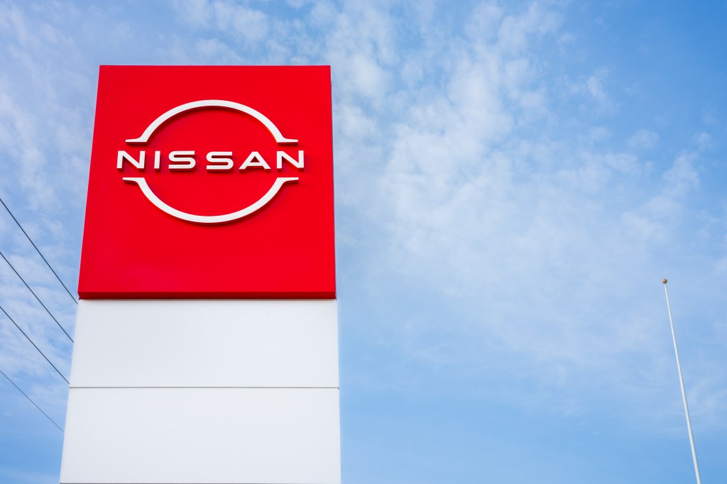 A sign at the South Austin Nissan dealership announcing the Honda and Nissan electric vehicle partnership in March 2024