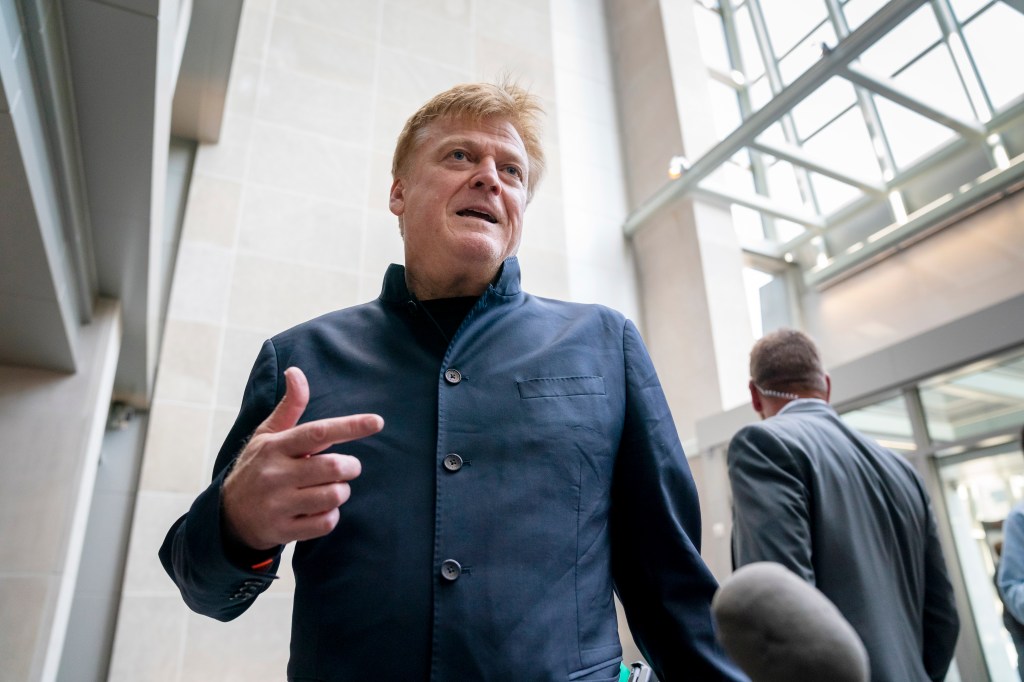 Patrick Byrne, former CEO of Overstock.com, arrives at Capitol Hill. No visible celebrities detected.