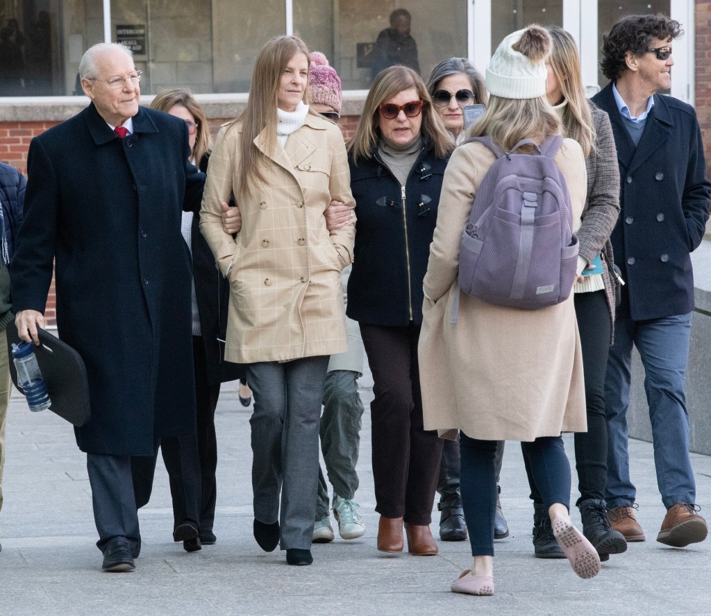 Michelle Troconis arrives at court with family on Friday morning.