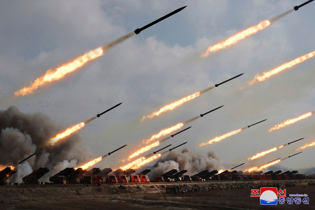 The Korean People's Army conducts an artillery firing drill at an undisclosed location in North Korea.