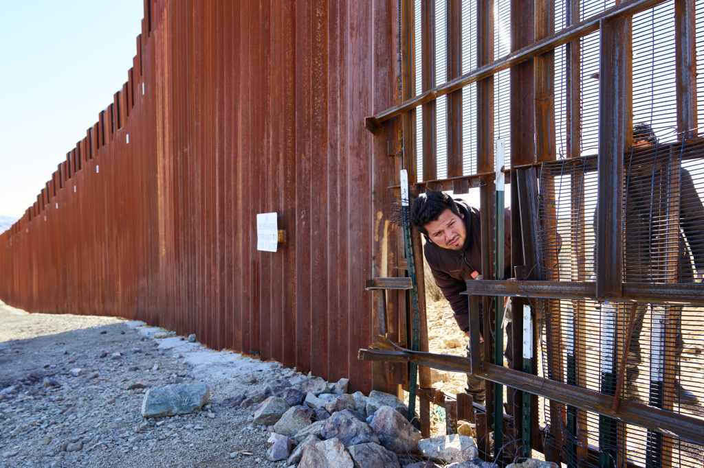 Migrants from Mexico who did not want to claim asylum crossed a gap in the U.S.-Mexico border wall on Monday, February 12, 2024 near Sasabe, Arizona.