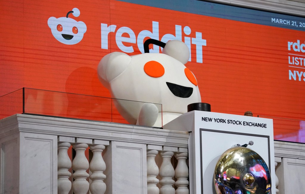 Reddit mascot Snoo rings the opening bell on Thursday.