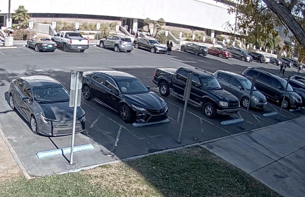 This image from campus surveillance video Polito (top center) getting out of his car before a deadly shooting on Dec. 6, 2023.