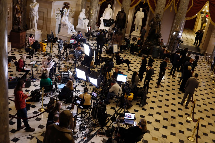 Journalists working in Statuary Hall in the U.S. Capitol, March 07, 2024 during President Biden's State of the Union address.