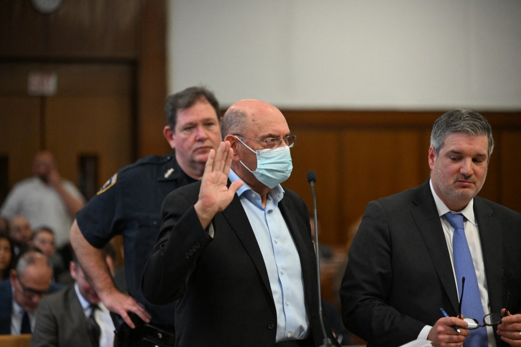 Allen Weisselberg, former CFO of Trump Org, is sworn in at Manhattan Criminal Court, pleads guilty to perjury charges, wearing a mask, suit and tie.