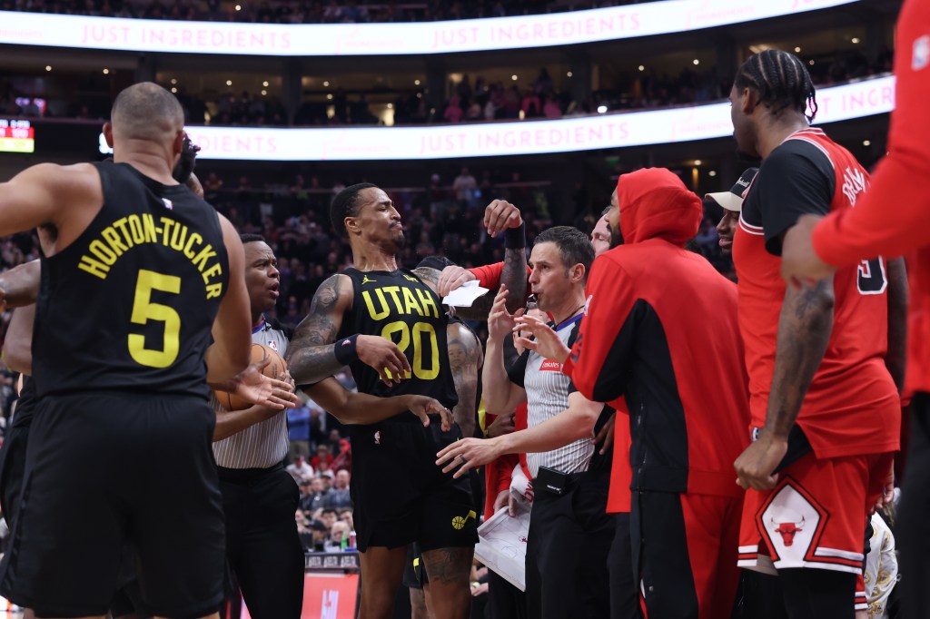 Utah Jazz forward John Collins (20) is called for a technical foul in the game against the Chicago Bulls during the fourth quarter at Delta Center. 