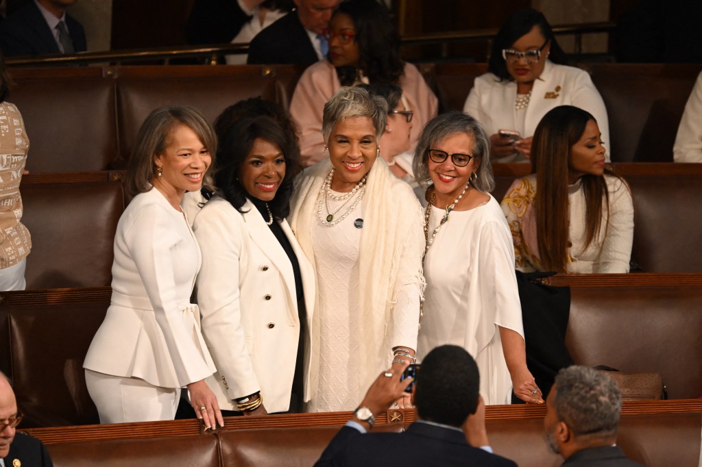 Democratic Representatives dress in white to call attention to women's rights on the floor of the House of Representatives in the House Chamber of the US Capitol in Washington, DC, on March 7, 2024.
