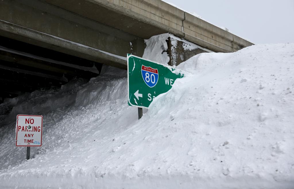 Snow is piled up under I-80 following a massive snowstorm in the Sierra Nevada mountains on March 4, 2024 near Soda Springs, Calif. 