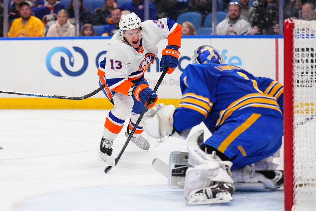 Ukko-Pekka Luukkonen #1 of the Buffalo Sabres tends goal against Mathew Barzal #13 of the New York Islanders during an NHL game on March 14, 2024 at KeyBank Center in Buffalo, New York. 