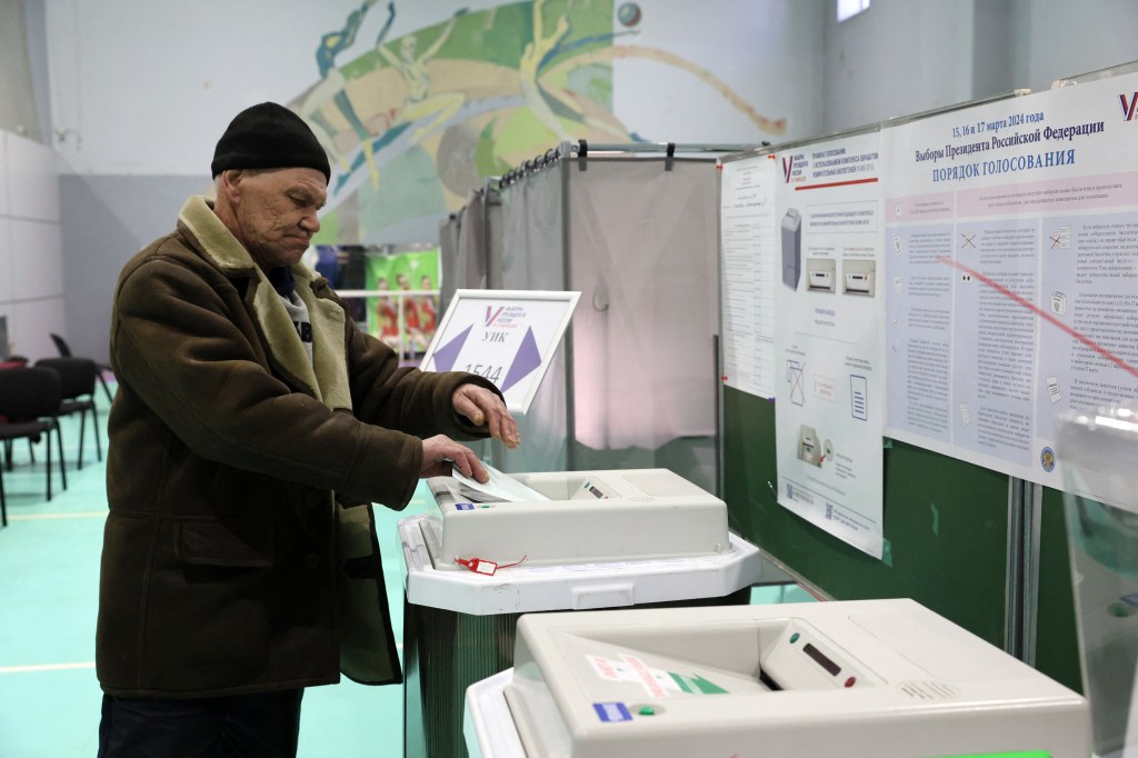 A man casts his ballot in Russia's presidential election in Yekaterinburg in the Urals on March 17, 2024.