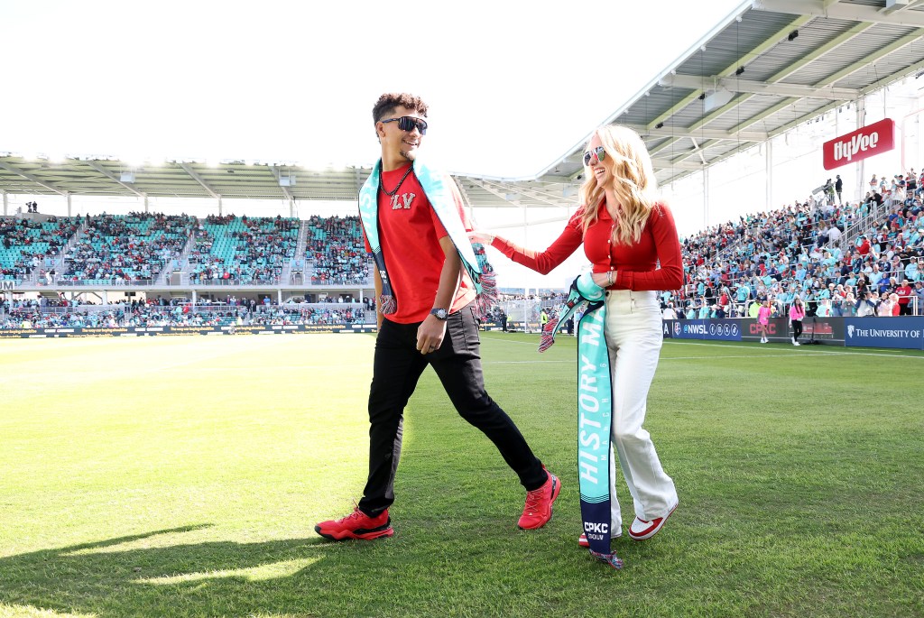 Co-owners Brittany and Patrick Mahomes walk on the field prior to the match between the Portland Thorns FC and the Kansas City Current at CPKC Stadium, the first stadium purpose-bult for women's soccer, on March 16, 2024 in Kansas City, Missouri.