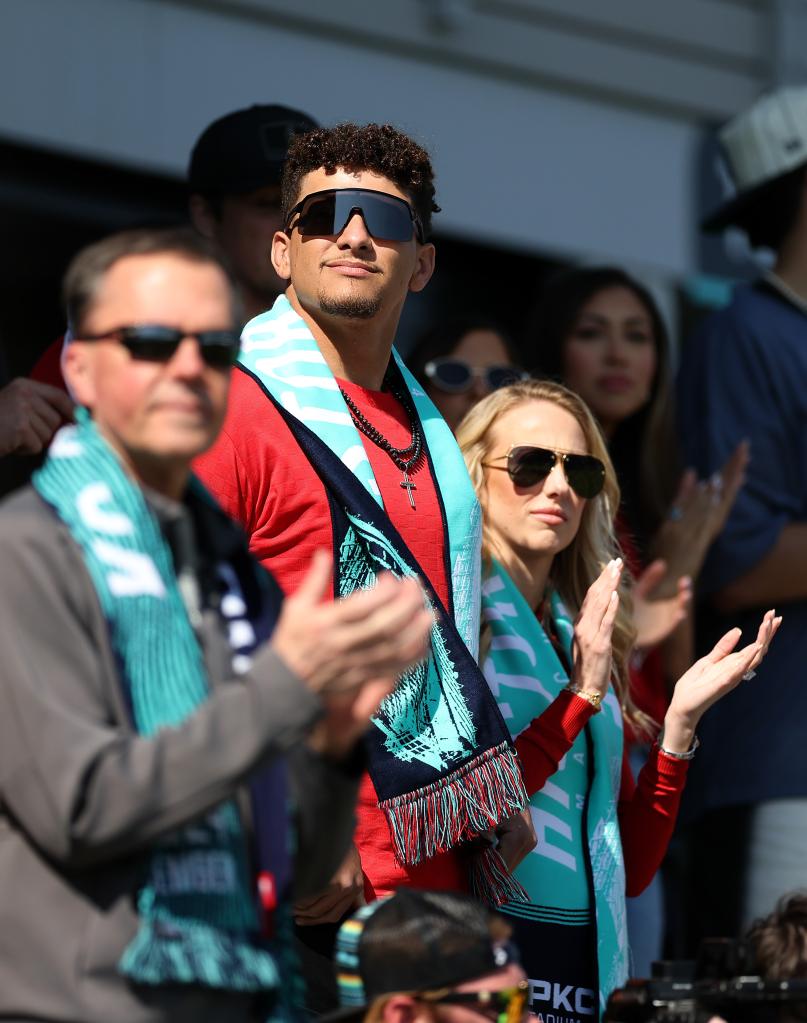   Co-owners Brittany and Patrick Mahomes walk applaud prior to the match between the Portland Thorns FC and the Kansas City Current at CPKC Stadium