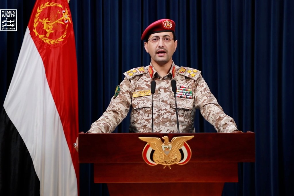 In this handout footage provided by the Houthi media center, showing Yemen's Houthi Group Military spokesperson brigader Yahya Sarea gives a military statement on March 19, 2024.