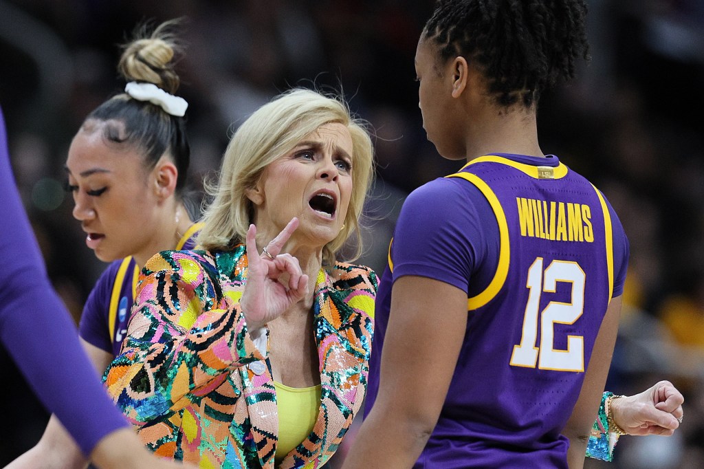 Head coach Kim Mulkey of the LSU Tigers reacts to Mikaylah Williams #12 of the LSU Tigers in a game against the UCLA Bruins during the first half in the Sweet 16 round of the NCAA Women's Basketball Tournament at MVP Arena on March 30, 2024 in Albany, New York. 