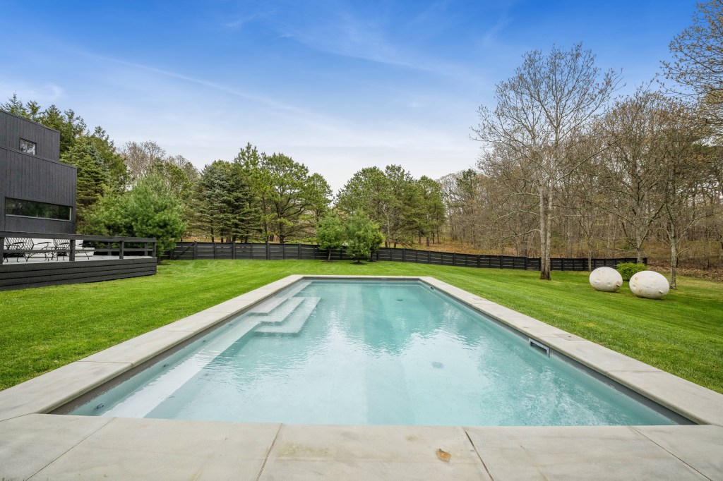 The heated pool is sure to make a splash at summer soirées.