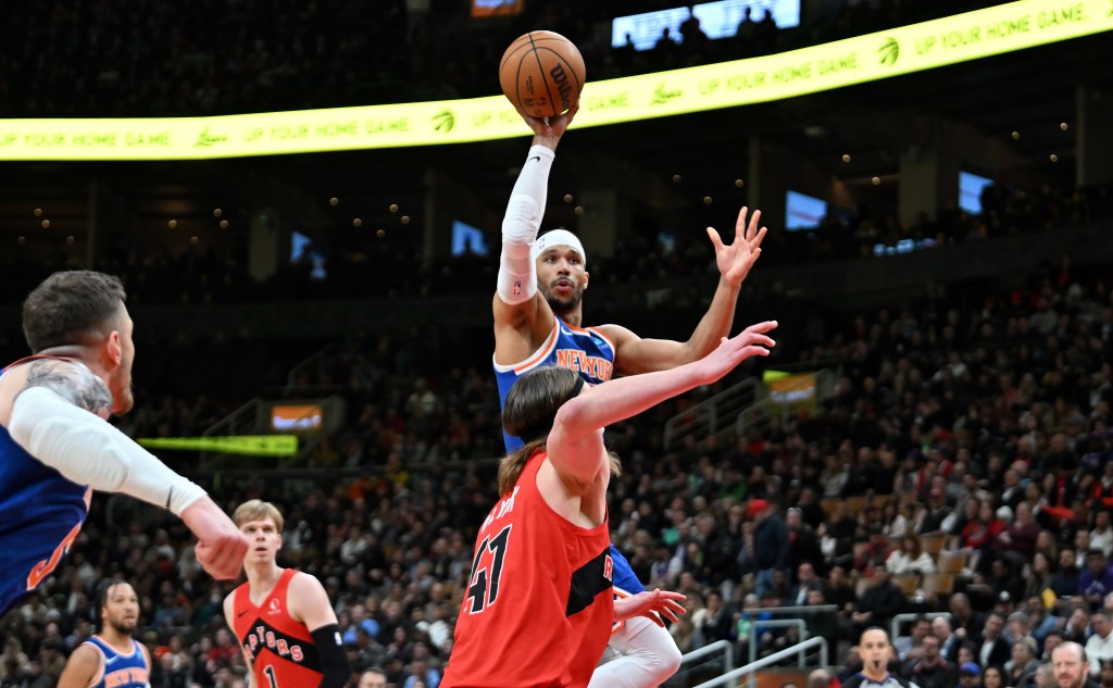 Knicks forward Josh Hart (3) shoots the ball over Toronto Raptors forward Kelly Olynyk (41) in the first half at Scotiabank Arena.