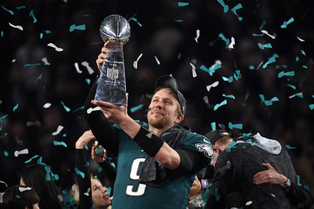 Nick Foles hoists the Lombardi Trophy.