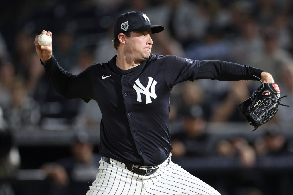 New York Yankees starting pitcher Gerrit Cole (45) throws a pitch against the Toronto Blue Jays 