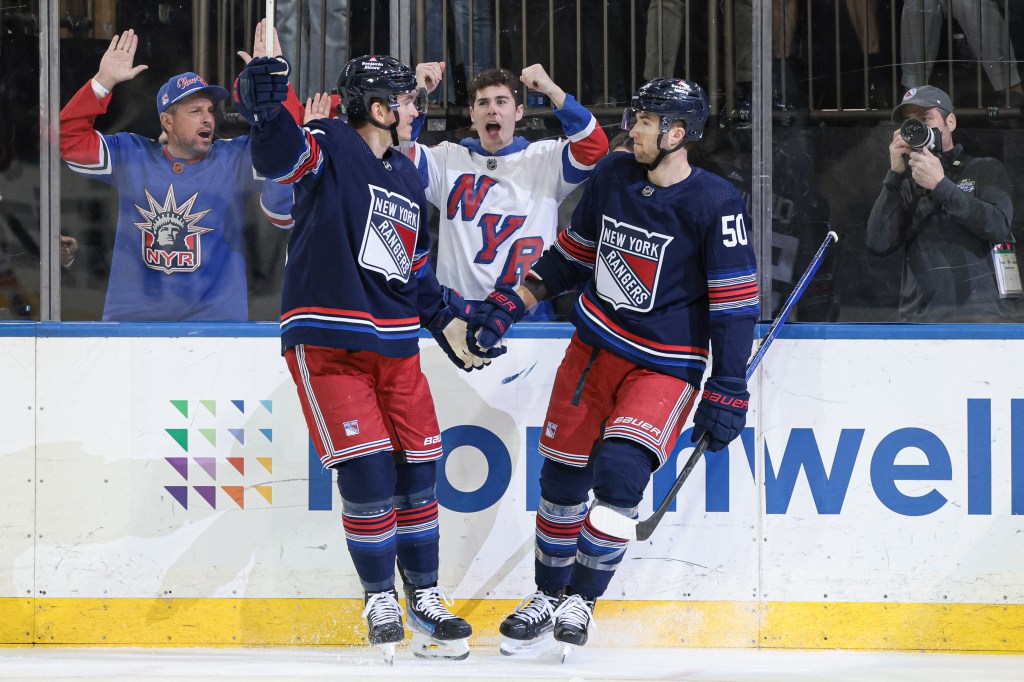  Rangers left wing Will Cuylle (50) celebrates his goal with left wing Jimmy Vesey (26) against the Islanders.