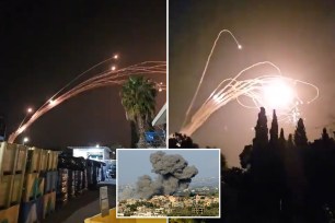 Israel's Iron Dome air defense system intercepted 13 Hezbollah missiles after the terror group fired more than 30 toward the city of Kiryat Shmona on Tuesday night, officials said.