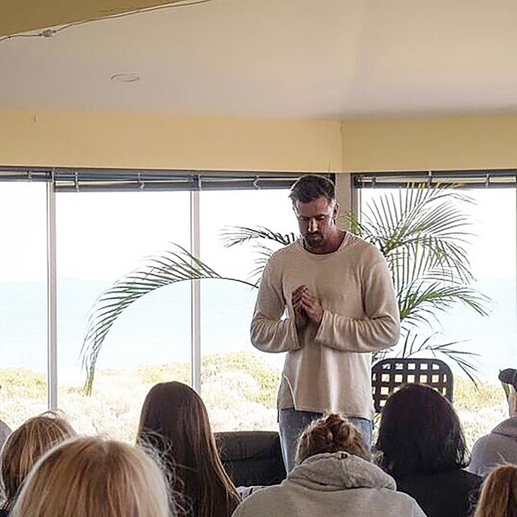 A man standing in front of a group of people