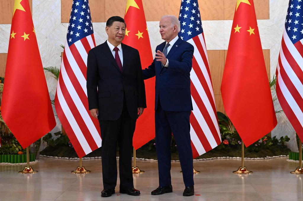 President Joe Biden (R) and Chinese President Xi Jinping hold a meeting on the sidelines of the G20 Summit in Nusa Dua on the Indonesian resort island of Bali, November 14, 2022.