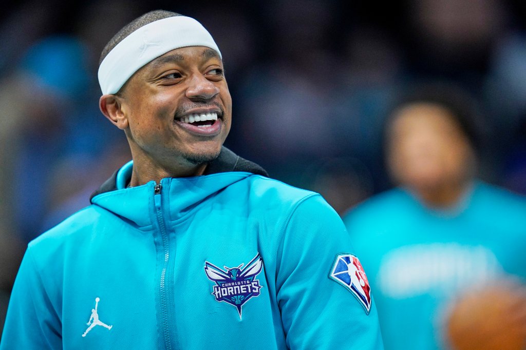 Charlotte Hornets guard Isaiah Thomas smiles during warm ups at an NBA basketball game against the Washington Wizards on Sunday, April 10, 2022, in Charlotte, N.C.