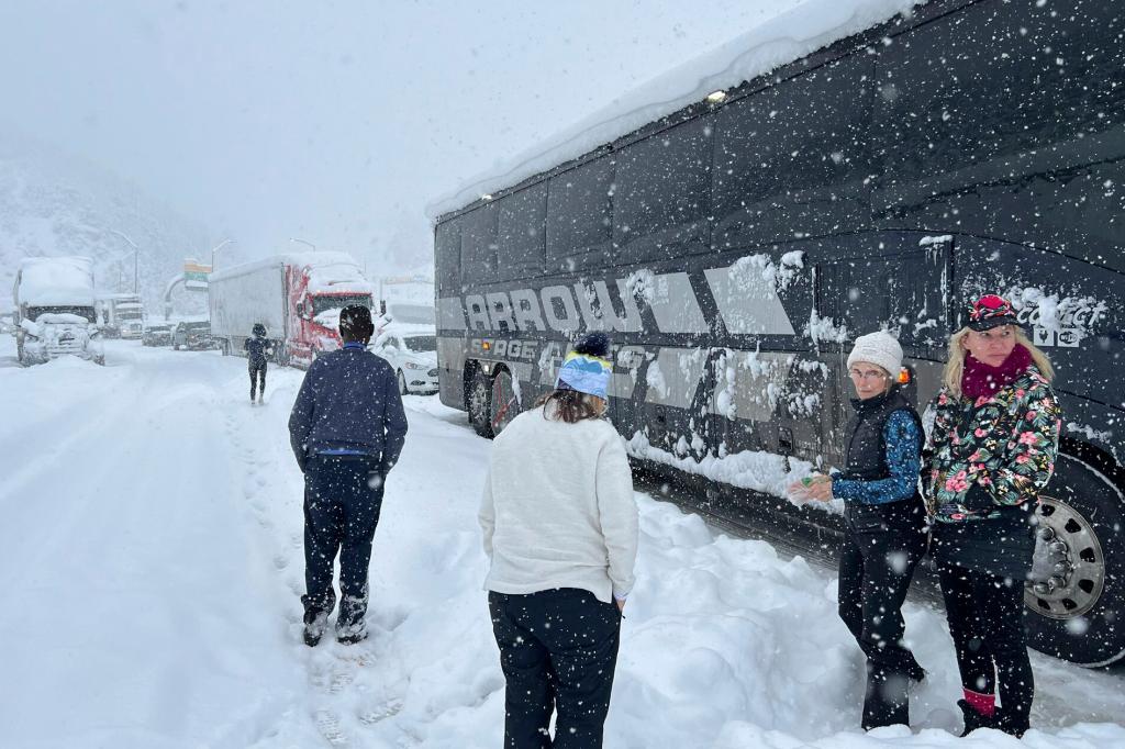 A weekly ski trip for about 50 women from the Denver area turned into an overnight ordeal when their bus got stuck in a snowstorm behind jackknifed semi tractor-trailers on their way back from Vail.